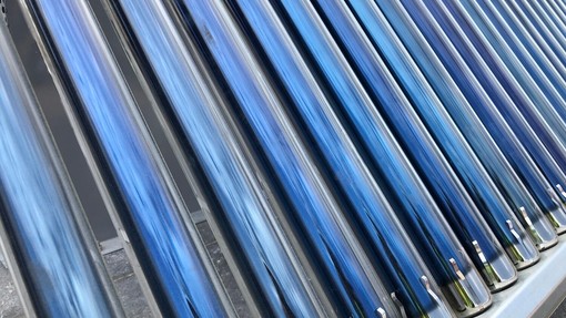 Up close shot of thermal hot water system on the roof of a house