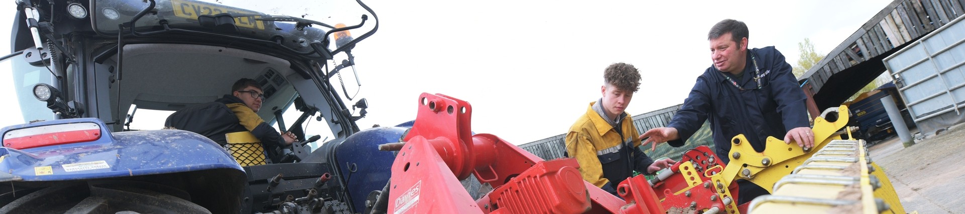 A student learns about his tractor.