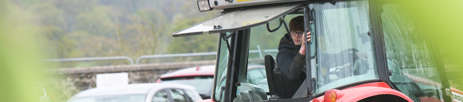 A student reversing his tractor.