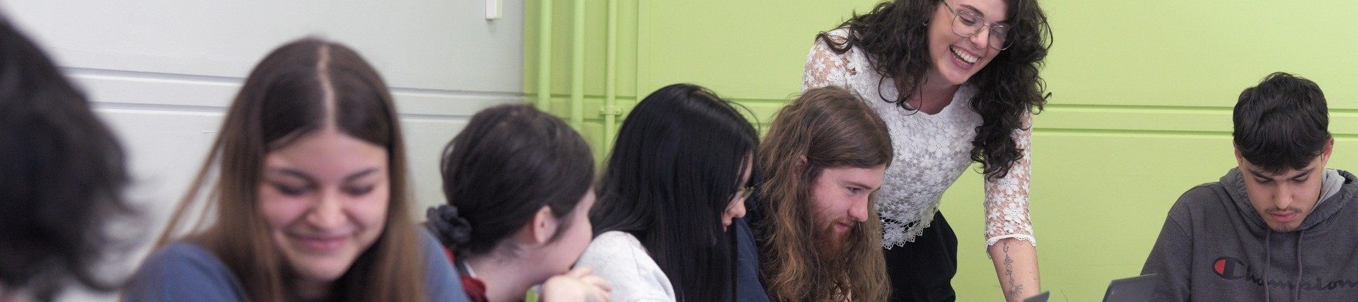 Students in the classroom with a teacher