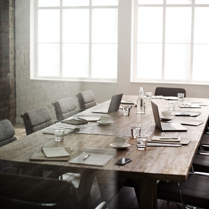 Long table in a meeting room.