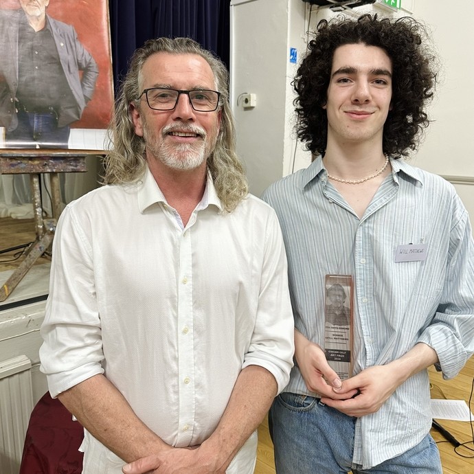 Luke Osmond and Will Matthews holding award